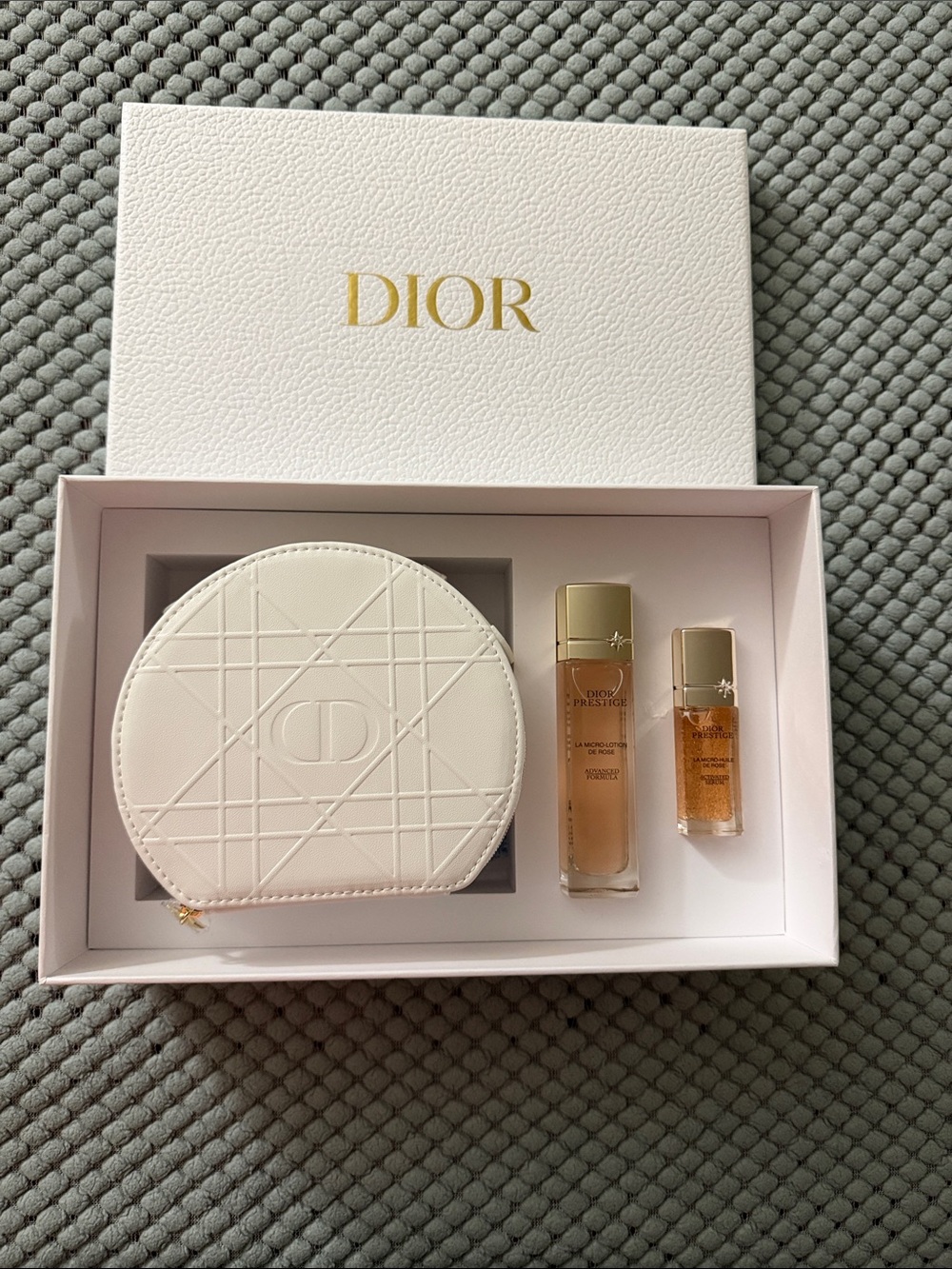 Dior Prestige White Leather Round Cosmetic Pouch with Gold-Accent Serums